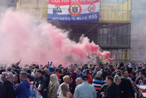 Rangers fans celebrate winning the Premiership