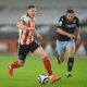john lundstram in action for sheffield united