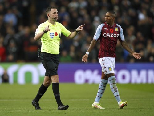 Aston Villa's Ashley Young protests with the referee