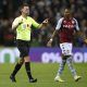 Aston Villa's Ashley Young protests with the referee