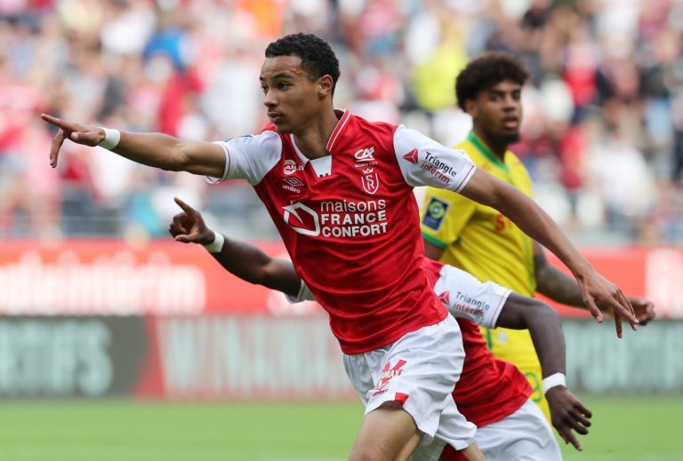 Hugo Ekitike of Reims celebrates