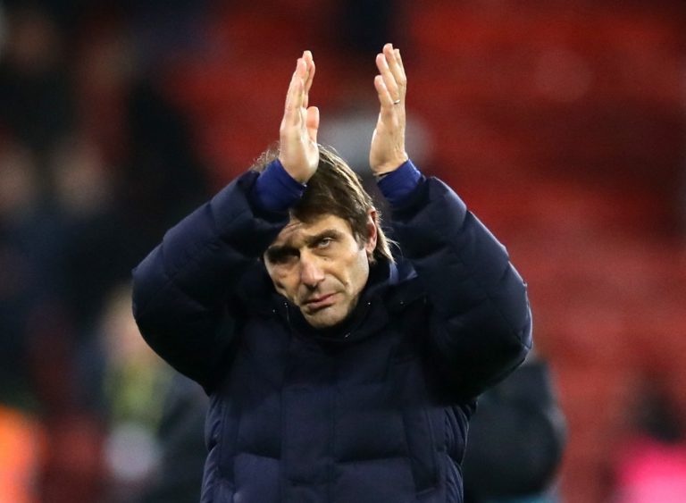 tottenham boss antonio conte applauds