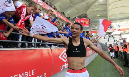 Reims striker Hugo Ekitike celebrates
