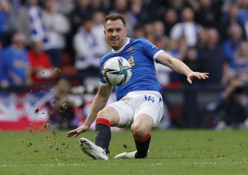 Rangers midfielder Aaron Ramsey passes the ball