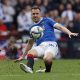 Rangers midfielder Aaron Ramsey passes the ball