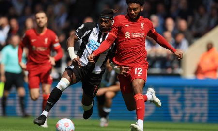 Liverpool defender Joe Gomez battles for the ball