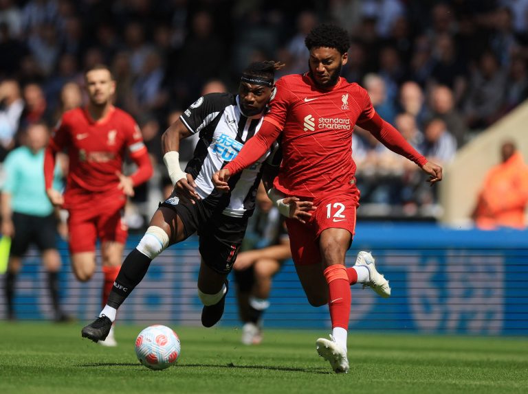 Liverpool defender Joe Gomez battles for the ball