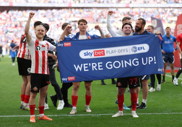 Sunderland's Alex Pritchard and Patrick Roberts celebrate after the League One play-off final