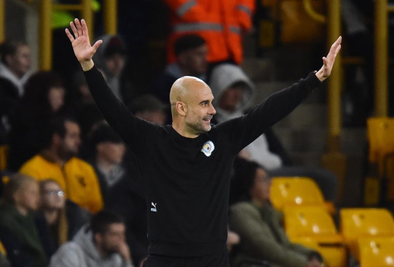Man City boss Pep Guardiola celebrates