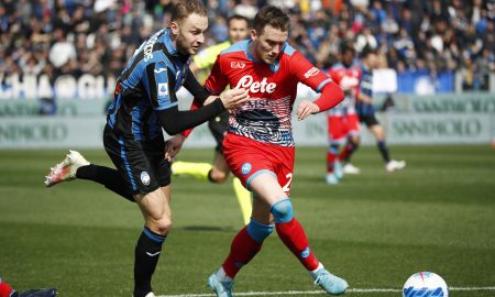 Napoli playmaker Piotr Zielinski battles