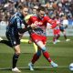 Napoli playmaker Piotr Zielinski battles