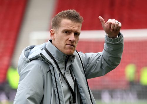 Steven Davis salutes the Rangers fans