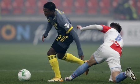 Man Utd target Tyrell Malacia in action for Feyenoord