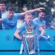 Man City's Oleksandr Zinchenko celebrates with the Premier League trophy