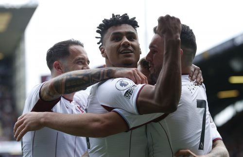 Aston Villa players celebrate scoring vs Burnley