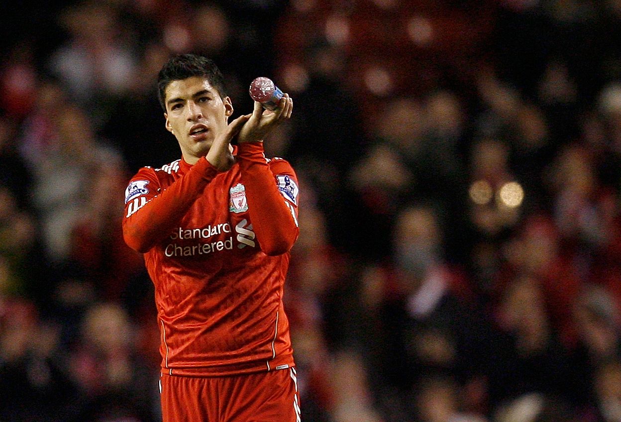 Liverpool star Luis Suarez claps supporters at Anfield