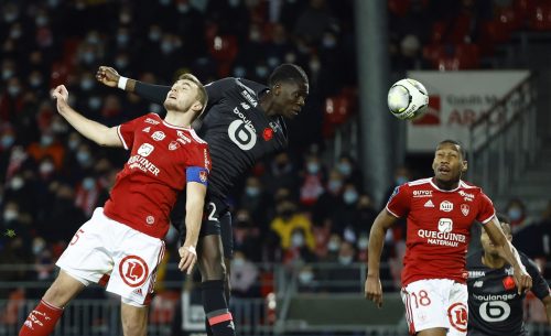 West Ham transfer target Amadou Onana heads towards goal