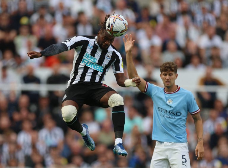 Newcastle's Allan Saint-Maximin wins a header