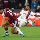 West Ham target Emerson Palmieri challenges for the ball