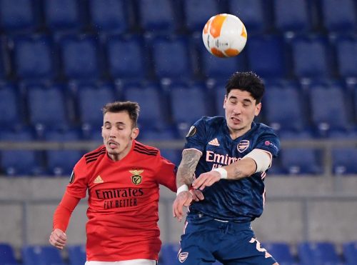 Arsenal's Hector Bellerin challenges for a header