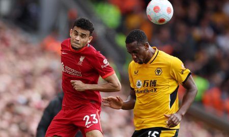Wolves defender Willy Boly challenges Luis Diaz