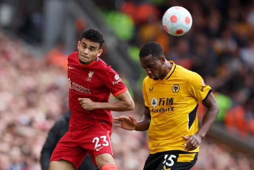 Wolves defender Willy Boly challenges Luis Diaz