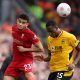 Wolves defender Willy Boly challenges Luis Diaz