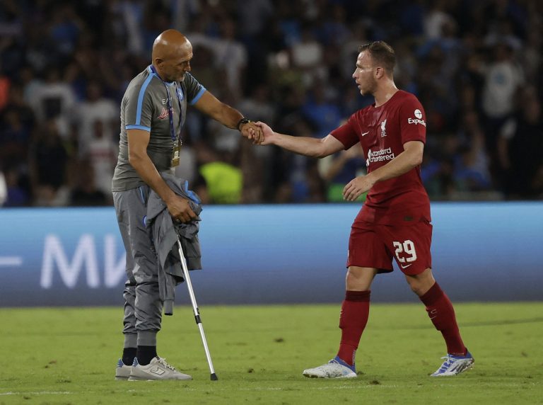 Liverpool's Arthur Melo greets Napoli manager Luciano Spalletti