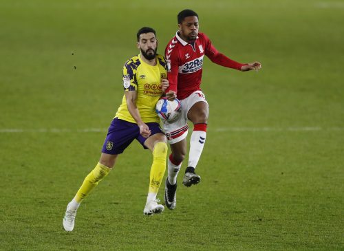 Middlesbrough's Chuba Akpom in action with Huddersfield Town's Alejandro Vallejo