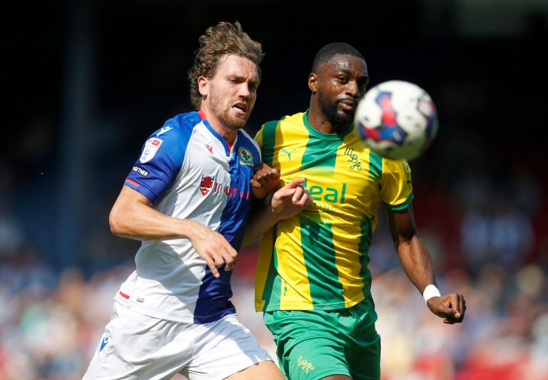 West Brom's Semi Ajayi is challenged by Sam Gallagher