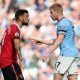 Man United's Bruno Fernandes argues with Kevin de Bruyne