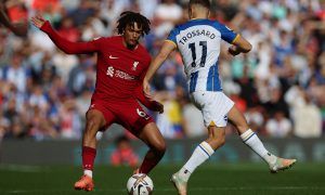Liverpool's Trent Alexander-Arnold takes on Leandro Trossard