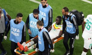 Cheikhou-Kouyate-being-stretchered-off-for-Senegal