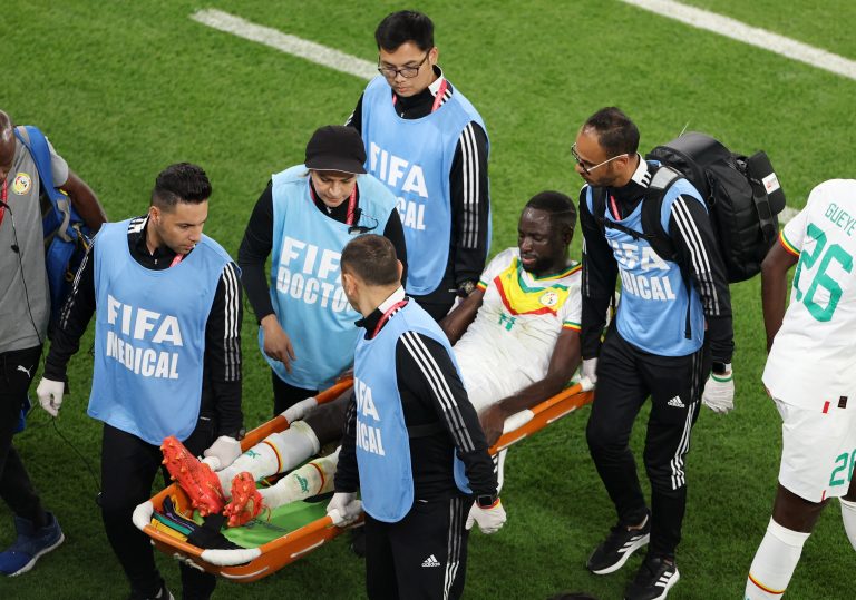 Cheikhou-Kouyate-being-stretchered-off-for-Senegal