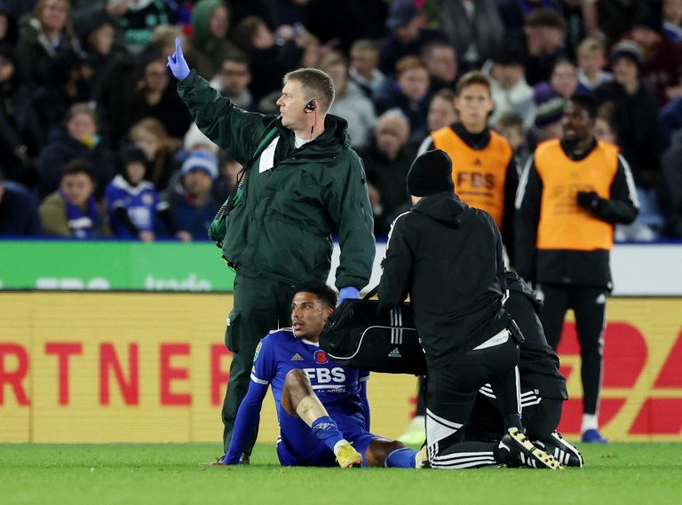 James-Justin-receiving-medical-attention-whilst-in-action-for-Leicester