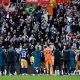 Newcastle United players celebrate with their fans