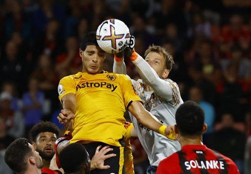 Wolves striker Raul Jimenez goes up for a header