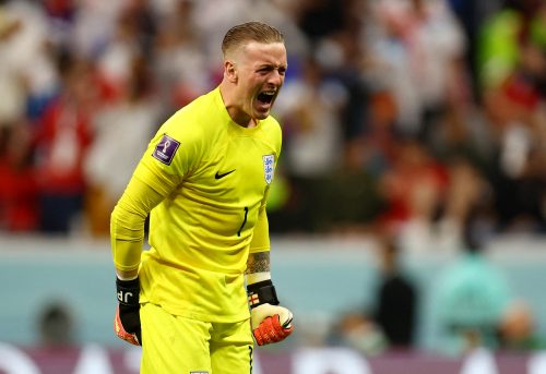 England's Jordan Pickford celebrates their first goal against France