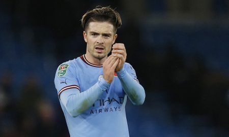 Manchester City's Jack Grealish applauds fans after the match