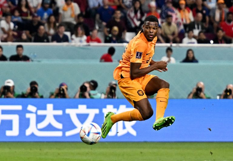 Netherlands' Denzel Dumfries scores their third goal