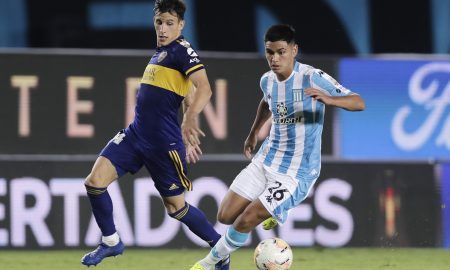 Racing Club's Carlos Alcaraz in action with Boca Juniors' Nicolas Capaldo Pool