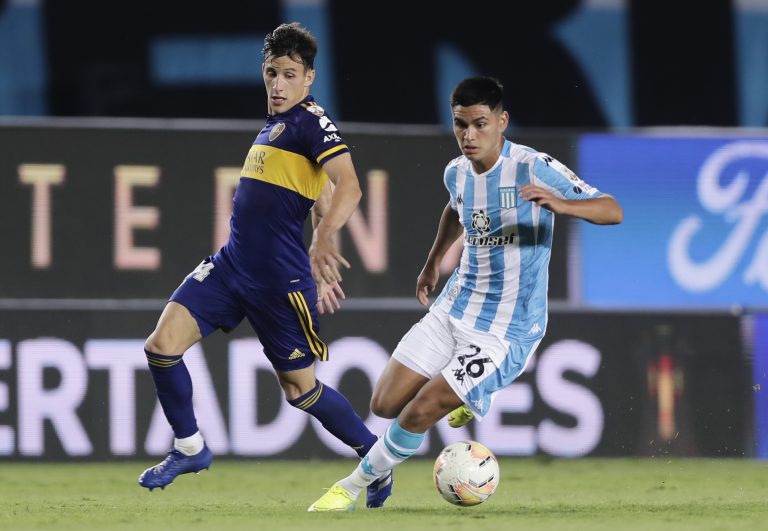 Racing Club's Carlos Alcaraz in action with Boca Juniors' Nicolas Capaldo Pool