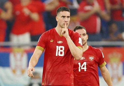 Serbia's Dusan Vlahovic celebrates scoring their second goal with Andrija Zivkovic