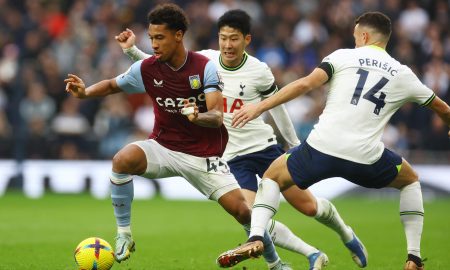 Aston Villa's Boubacar Kamara in action with Tottenham Hotspur's Son Heung-min and Ivan Perisic