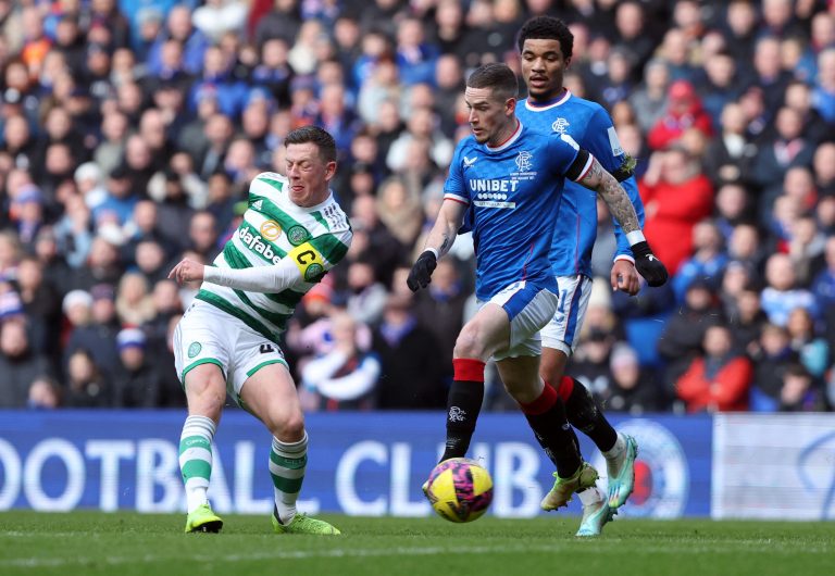 Celtic's Callum McGregor in action with Rangers' Ryan Kent