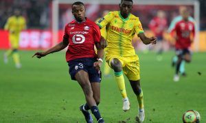 Lille's Tiago Djalo in action with Nantes' Randal Kolo Muani