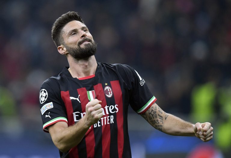 AC Milan's Olivier Giroud celebrates after the match