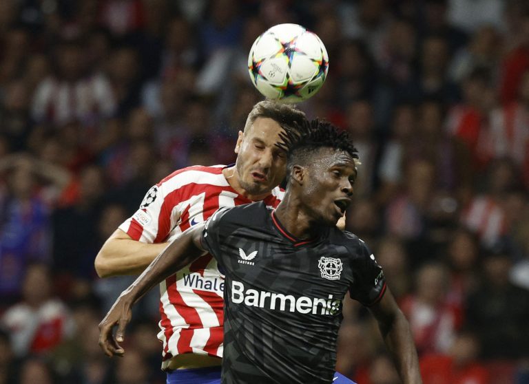 Atletico Madrid's Saul Niguez in action with Bayer Leverkusen's Odilon Kossounou