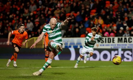 Celtic's Aaron Mooy scores their second goal from the penalty spot