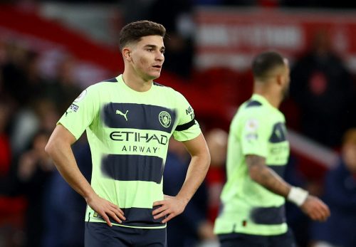 Manchester City's Julian Alvarez looks dejected after the match